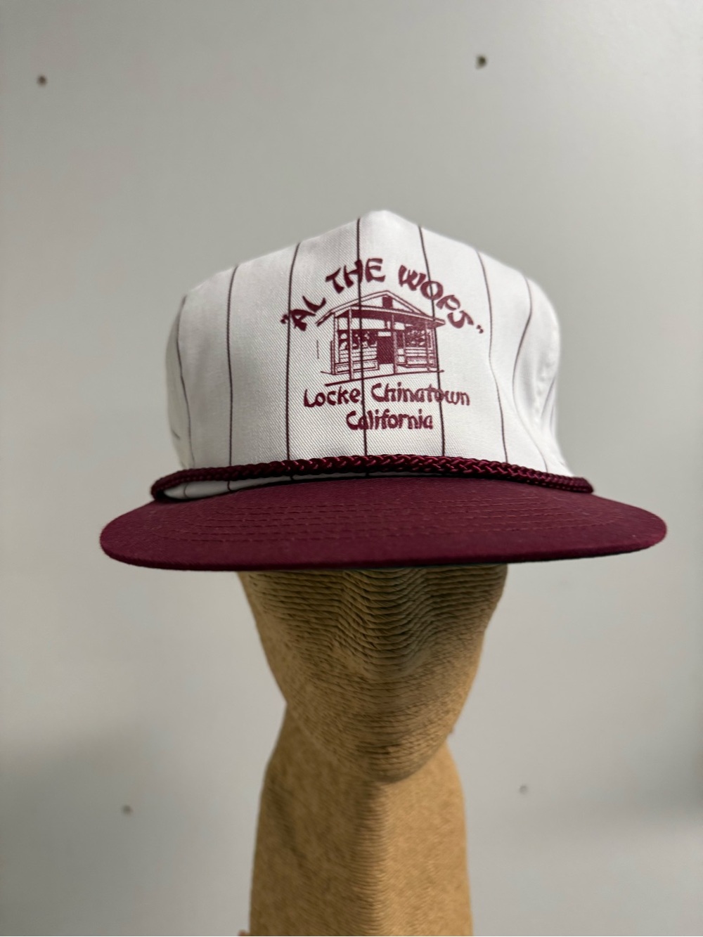 Vintage 1990s souvenir Chinatown baseball hat with pinstripes and maroon brim